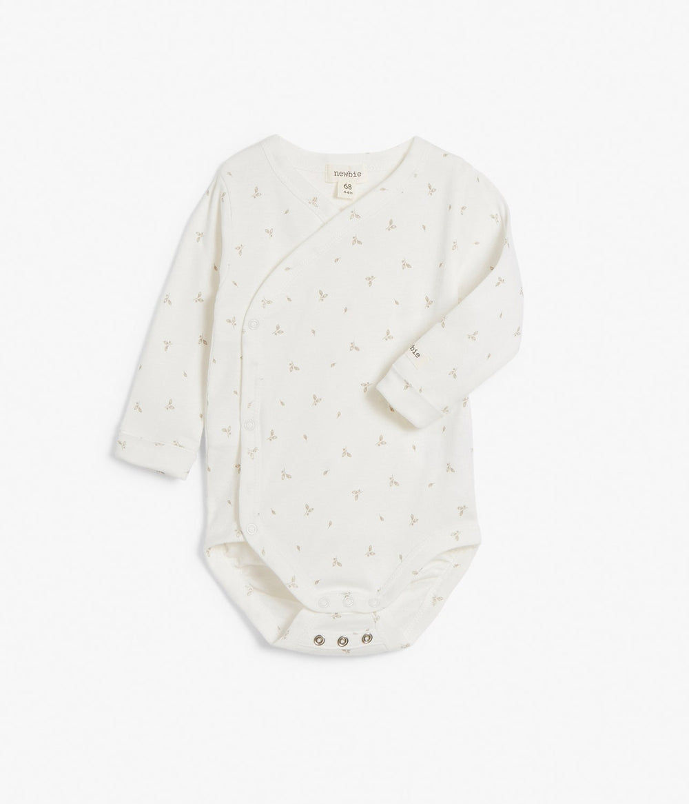 Baby white leaf patterned bodysuit –